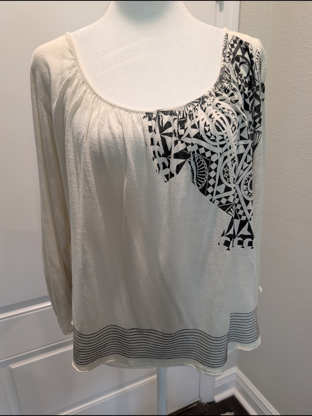 Language Cream Long-Sleeve Scoop Neck Top with Black Geometric Accent